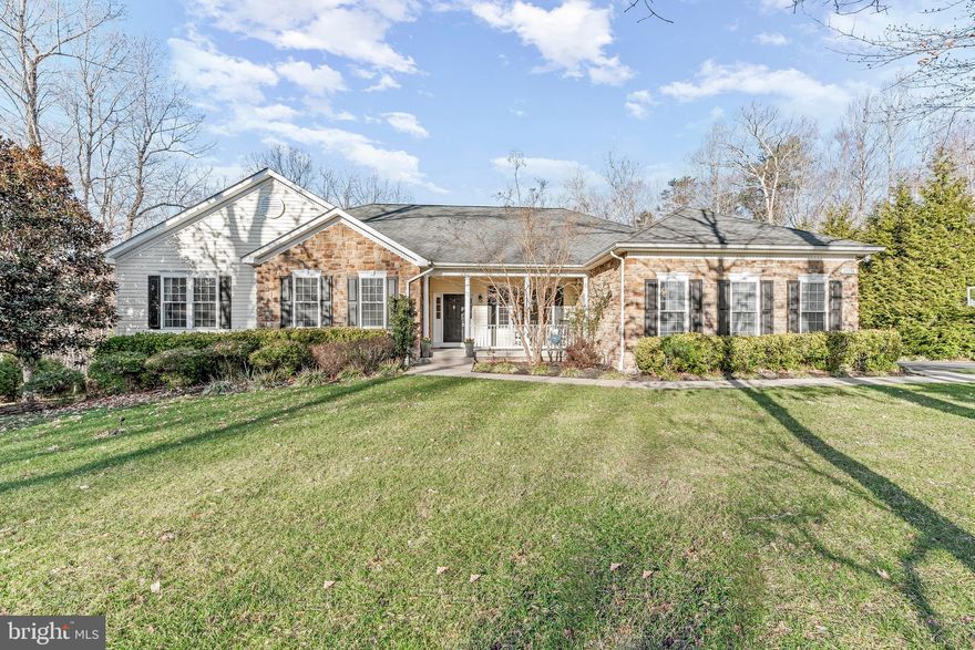 Located on a quiet cul-de-sac in the sought-after Forrest Farm community, this beautifully maintained ranch-style home offers exceptional space, flexibility, and thoughtful design throughout. Inside, an open and airy floor plan is highlighted by hardwood and ceramic tile flooring, crown molding, and chair rail accents. The gourmet kitchen is designed for both everyday living and entertaining, highlighted by stainless steel appliances, a large center island and pantry, and seamless flow into the family room, where a gas fireplace creates a warm gathering space.
The main level offers true one-level living, including two generously sized bedrooms and a spacious primary suite with a soaking tub, deluxe shower, walk-in closet, and private bath. A main-level laundry room adds everyday convenience.
The fully finished walk-out lower level dramatically expands the living space and is ideal for multigenerational living, guests, or entertaining. This level features a massive recreation room, wet bar, three additional bedrooms, and two full bathrooms, along with a dedicated sauna room, creating a private wellness retreat at home. A small unfinished storage area provides practical storage and includes additional laundry hookups, offering flexibility for future use.
Outdoor living is equally impressive, with a front porch, two-story shed, expansive deck, and patio overlooking mature trees and wooded views, providing privacy and a peaceful setting for relaxing or hosting gatherings. A side-entry three-car garage and generous driveway offer ample parking and storage.
Residents of Forrest Farm enjoy access to community amenities, including a pool, sports courts, and playgrounds, which enhance the lifestyle this neighborhood provides in a most convenient location. Offering the ease of main-level living combined with a fully finished lower level designed for versatility, this home delivers space, comfort, and exceptional value in one of the area’s most desirable communities.