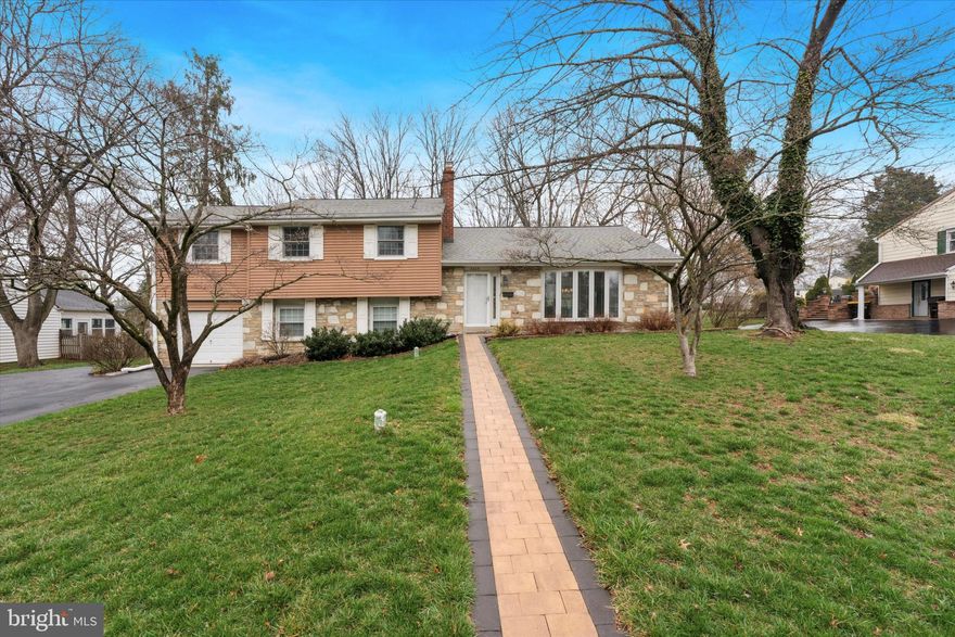 This beautifully maintained 4-bedroom, 2.5-bath home offers the perfect blend of comfort and convenience in a quiet, no-HOA neighborhood. Thoughtfully updated throughout, this home features an updated kitchen, gorgeous hardwood floors, a spacious backyard, and replacement windows with built-in blinds.

Step inside and be welcomed by the stone-stacked fireplace, the focal point of the cozy family room. A large bay window fills the space with natural light. The recently renovated kitchen shines with corian countertops, ceiling-high cabinets, and stainless steel appliances. All bathrooms have been updated for modern convenience.

The lower level provides additional living space with access to the large, fenced backyard, perfect for outdoor enjoyment. The redone back patio ensures proper drainage and easy maintenance.

Upstairs, you’ll find spacious bedrooms with ample closet space, making this home as functional as it is beautiful.

Located just minutes from shopping, dining, and major roadways, this home is a must-see!