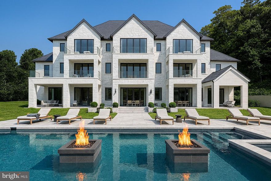 Tucked away at the end of a quiet, private cul-de-sac in one of Potomac’s most sought-after neighborhoods sits something truly special: 2.6 acres of pure possibility. This is your chance to build a stunning contemporary residence of roughly 13,000 square feet that feels more like a private resort than a home.

Imagine a beautifully designed estate with six bedrooms and nine bathrooms, anchored by an incredible primary suite complete with a spacious lounge area, a fireplace, massive closets, and a spa-like bathroom you’ll never want to leave. The rest of the house is just as thoughtful; there’s a dedicated office, a library, exquisite stone and woodwork throughout, and every smart-home feature you could possibly want.

Outside, the fun really begins. You’ve got a cabana with a full outdoor kitchen, cascading waterfalls feeding into the pool, your own basketball/pickleball sport court, a private putting green, and plenty of inviting spots to gather with friends and family. There are organic gardens if you love to grow things, and we’ve even included space for a fantastic indoor spa so you can unwind year-round, no matter the weather.

Picture this: hosting a lively ping-pong tournament on the sport court, practicing your short game on the putting green at golden hour, or gathering everyone around the fire pit with music flowing through the surround-sound system. With parking for up to ten cars, you can easily bring in a house full of guests. And when the party’s over, slip away to your home office or gym, then end the night soaking in the tub of your spa-inspired primary bath while enjoying those serene pool views.

Every last detail here can be customized exactly the way you want it. This is more than just a luxury home; it’s your personal escape, where sophistication meets total tranquility.

Ready to make it yours?