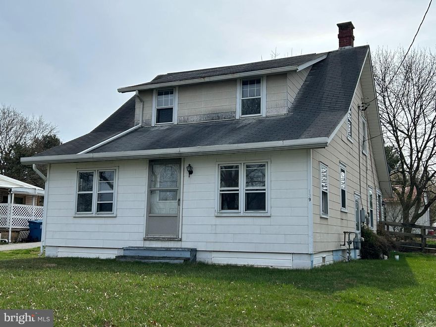 Come bring your tools and skills.  Check out this 3 bedroom 1 bath cape cod on a .98 acre lot.  Has a detached oversized 2 car garage.  Lots of possibilities to make this your home.  Close to I-83. House needs a lot of work inside and out. Shed on property stays.  SOLD AS IS.  Seller makes no repairs. Lots of space for gardens on large lot.  Furnace newer.