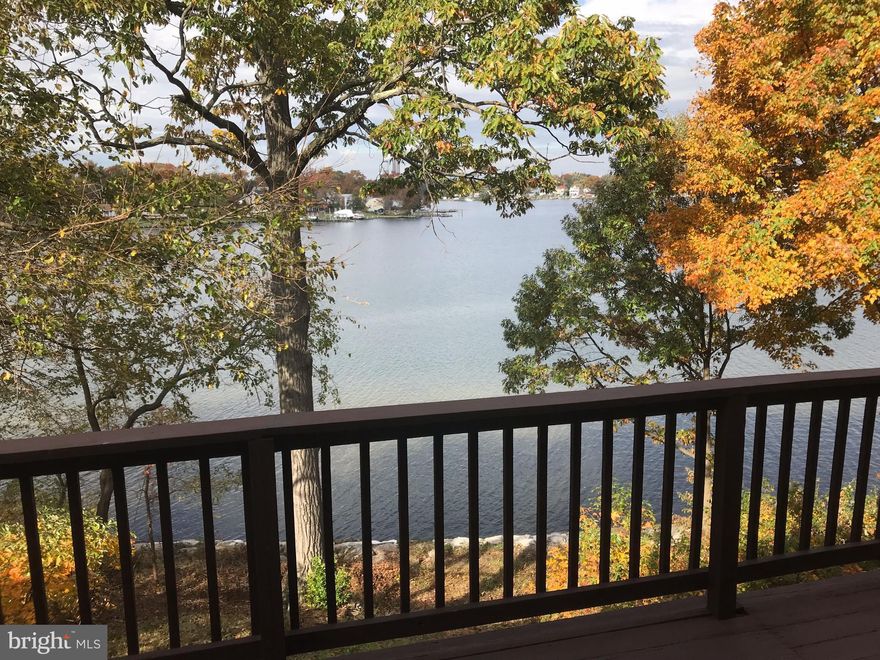 Waterfront unit ready for you to move in. 2 Decks and a screened in porch that over looks Stoney creek. This is a water privileged community with boat ramp, pier and walking distance to Sunset Elm. This home has new paint, carpet and open kitchen with newer appliances. Down stairs take advantage of the electric fire place, Familyrm that looks over the water w/ access right out back. Call 2 see