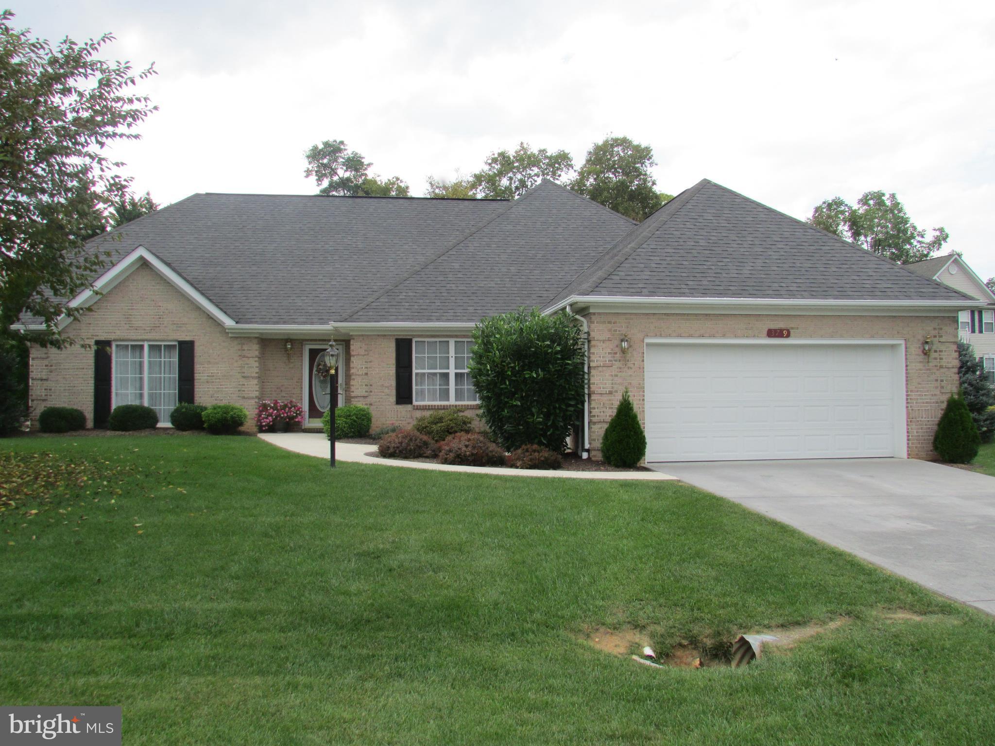 Immaculate ranch style home located near the Locust Hill Golf Course. Large living room w/gas fireplace, master bedroom has large walk-in closet, 2 sep. vanities, sep. shower, garden tub and ceramic tile. Den could be converted to third bedroom. Large deck on back with retractable awning. This house is a must see!!