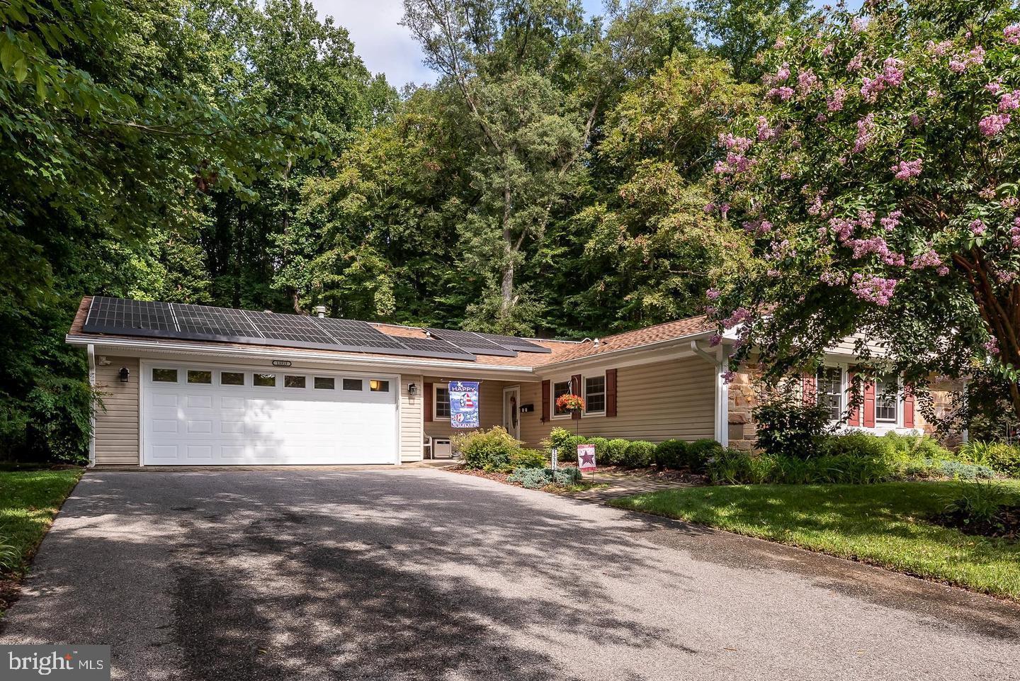 Welcome to this beautifully updated single-level rancher, ideally located on a private, wooded lot in the desirable Overbrook at Belair community. This spacious 4-bedroom, 2-bathroom home offers the perfect combination of comfort, style, and functional indoor-outdoor living.
Inside, you'll find luxury vinyl plank hardwood floors throughout the main living areas, plush carpeting in the bedrooms, and abundant natural light in every room. The spacious kitchen features granite countertops, stainless steel appliances, and a large pantry—ideal for both everyday cooking and entertaining. A separate formal dining room provides a warm setting for meals and gatherings.
The home also offers a bright formal living room, a large family room, and a sunroom addition—giving you plenty of flexible living space. A dedicated laundry room with a new washer and dryer, an expanded double garage, and a 5-car driveway add to the home’s everyday convenience.
Step outside to your beautifully landscaped and fully fenced backyard. The space is perfect for relaxing or entertaining, complete with a cozy fire pit and patio furniture—all of which will remain with the rental. Additional highlights include a sprinkler system and solar panels for improved efficiency.
Nestled in a quiet community with easy access to nearby amenities, this home is a rare rental opportunity that offers both space and serenity.