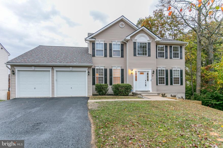 Welcome to 11 Pebble Beach Drive, a charming gem nestled in the heart of Stafford. This immaculate home offers a host of updates and features that make it a true standout in today's market. The brand new A/C unit ensures year-round comfort, while the entire house boasts fresh paint and new flooring that creates a clean, modern ambiance. The recently upgraded kitchen delights with a new gas stove, dishwasher, microwave, and resurfaced cabinets.

As you step inside, you're greeted by an open foyer that beckons you to explore further. With over 3,500 square feet of living space on a generous 0.21-acre lot, this home provides ample room for all your needs. The main level boasts a spacious family room, living room, dining room, and a sunroom that bathes in natural light. Conveniently, a laundry room adds to your daily ease.

Venture upstairs to discover four comfortable bedrooms and two full baths, offering the perfect blend of privacy and togetherness. The lower level shines as a fantastic entertainment space, complete with an XL rec room, two additional bedrooms, and another full bath – ideal for an in-law suite or guest quarters.

Outside, you'll appreciate the newer roof, a freshly updated deck, and a large backyard that's perfect for outdoor gatherings. The property sits on a peaceful cul-de-sac too!

Noteworthy features of this home include bay windows, ceiling fans for added comfort, professionally cleaned windows, and a new front door with a frame that enhances curb appeal and security.

11 Pebble Beach Drive is truly a must-see property, offering a perfect blend of modern comfort, ample space, and a prime location. Schedule your appointment today to make this your new dream home. Don't miss out on this opportunity – your future begins here!