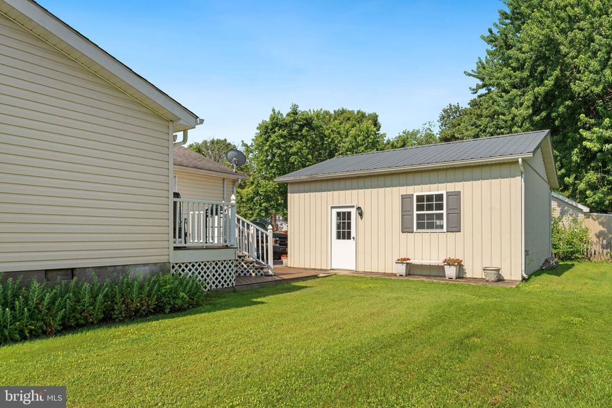 MOTIVATED SELLERS, WILL CONSIDER ANY REASONABLE OFFER! Back on the market with a new roof! This Kent Island home is back to active due to the previous buyers’ circumstances changing.  Move-in ready home featuring thoughtful updates, including a brand new roof, new well pump, HVAC system, stove, and refrigerator. For added peace of mind, a one-year home warranty is included.  With approximately 1,900 sq ft of living space (buyer to verify), this spacious 4-bedroom, 2-bath home offers plenty of room to relax, gather, and grow. Originally built in 1988 and expanded to include a large family room with vaulted ceilings, a welcoming front porch, and two decks surrounded by mature landscaping.  The detached garage provides ample storage and workspace, while a camper hook-up adds flexibility for guests or adventure-minded buyers. Located just one block from the water, the property includes access to a community beach perfect for launching kayaks and paddleboards. With its close proximity to the local marina and store this home beautifully combines comfort, character, and the laid-back lifestyle of the Eastern Shore.  The roof was completed 09/24/2025