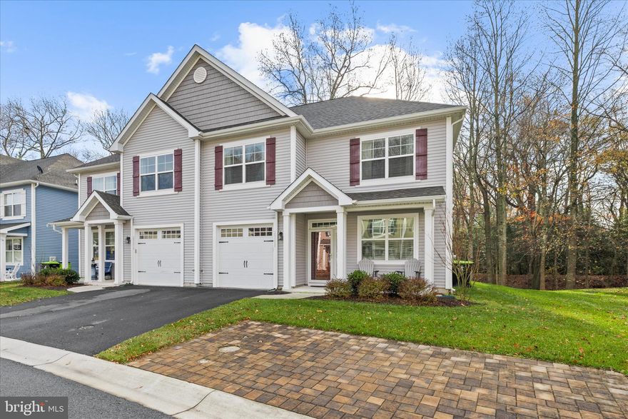 Move fast with this adjusted price! Enjoy a beautiful and serene creek view in this meticulously cared-for villa, located in Dagsboro in the Woodlands at Peppers Creek community where you are within walking distance of coffee shops, antique stores, and the beloved Clayton theater. Nestled towards the end of the cul-de-sac, this 2-story townhouse style villa home offers a perfect blend of privacy, space, woods and creek views. The main floor features a formal dining room at the front of the house, a 1/2 bath, laundry closet, well-equipped kitchen, open and airy two-story great room, and a spacious en-suite primary. The primary bath offers a double sink vanity, linen closet, walk-in shower and large walk-in closet. The kitchen countertops have been upgraded too with Consentino's Sense countertops that are a premium natural stone combining the natural beauty of granites and quartzites with an exclusive stain-resistant treatment that works at a molecular level, ensuring minimal countertop maintenance. Both the great room and the primary bedroom offer tranquil creek and woods views. Inviting luxury vinyl plank flooring called "Weathered Barnwood" was added in the great room and kitchen areas.  Upstairs is as good as new and barely used. At the top of the stairs you'll step into the generous loft area, providing additional flexible living space and is currently used as office/flex space. You'll also find two comfortably sized guest bedrooms both offering walk-in closets, a full guest bathroom, and a utility room that doubles as excellent walk-in storage space with added shelving.  Enjoy the remote Hunter Douglas shades in the great room and the plantation shutters at the front of the home in the dining room. Association performs annual gutter cleaning, power washing and termite inspections. Home offers an irrigation system for the lawn; lawn cutting and annual fertilizations covered by association. Original builder's floor plan brochure uploaded in documents. The sellers installed a beautiful paver patio in the rear of the home on the creek offers approximately 8x16 outdoor living enjoyment on the creek!