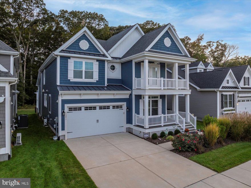 Set in the highly sought-after Governors community just  3 miles to the beach, this meticulously maintained 5-bedroom, 4.5-bath home by Schell Brothers sits on a premier lot backing to a private wooded buffer. A vaulted great room with abundant natural light centers the main level, anchored by a gas fireplace wrapped in custom shiplap. The first floor also features a primary suite with tray ceiling, spa bath, and dual walk-in closets, plus a dedicated home office, dining area, laundry, powder room, and extensive custom trim. The oversized 2-car garage includes an epoxy floor and built-in storage.

The chef’s kitchen impresses with matching appliances, a beautiful backsplash, statement countertops, and generous pantry space. Upstairs, an open landing overlooks the great room and leads to four large bedrooms and two full baths, along with a serene meditation room. The front bedroom offers a walkout lanai—the perfect spot for sunrise or sunset.

The fully finished lower level adds exceptional flexibility with a private bar, media/living area, full bath, fitness zone, second office, and ample storage. Notable upgrades include a tankless water heater and energy-efficient windows/appliances.

Outdoor living shines with a screened porch, adjoining dining area, and a custom pergola with motorized awnings—ideal for shaded summer gatherings—plus in-ground sprinklers and thoughtfully maintained landscaping. Residents enjoy resort-style amenities: clubhouse, fitness center, pool with swim-up bar, splash pad, playgrounds, and tennis courts.

A rare combination of location, lot, and livability—ready to call home.