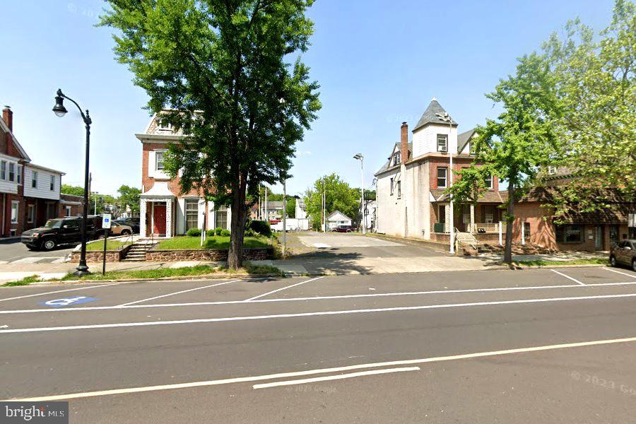 Amazing value for this building with first floor offices and 3+ Bedroom/2 Bath Apartment on 2nd and 3rd floors. Full Basement. Many improvements by current owners. New HVAC on first floor. Private parking lot in rear and on street parking in front. Back Alley. Sidewalks. Public bus route. Front and side entrances for office. Front and back entrances for apartment. Full basement for storage. Office consists of front reception area-Kitchenette-Powder Room-4 offices with one on 2nd floor-many built ins-closets. Apartment is very large and charming. The offices rent for $2500 not including utilities by a charitable organization. Apartment is not rented as of right now in a case the purchaser wants personal use of but going to start advertising for rent for $1600+ a month. Sellers agent has all documentation on current lease and expenses along with list of improvements. 3 separate electric meters. Separate heat for office and apartment. NO A/C in apt. Building total 3500+/- sq.ft. Businesses all around this property have been established for many years.