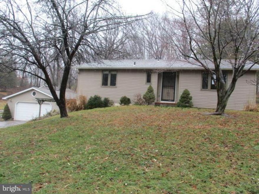 Country living with serene views from this Rancher sitting on 3.8 acres. Open floor plan on main level with huge eat in kitchen. Generous size bedrooms and full bath on main. Full lower level is finished with family room , bonus room and full bath . Walk out level on side. Detached over sized 2 car garage and 3 out buildings,  room for all your outside equipment. Close to schools & shopping.