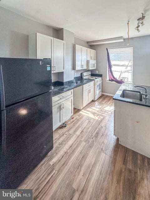 Townhouse For Sale - 1203 N Milton Avenue<br/> BALTIMORE, MD 21213