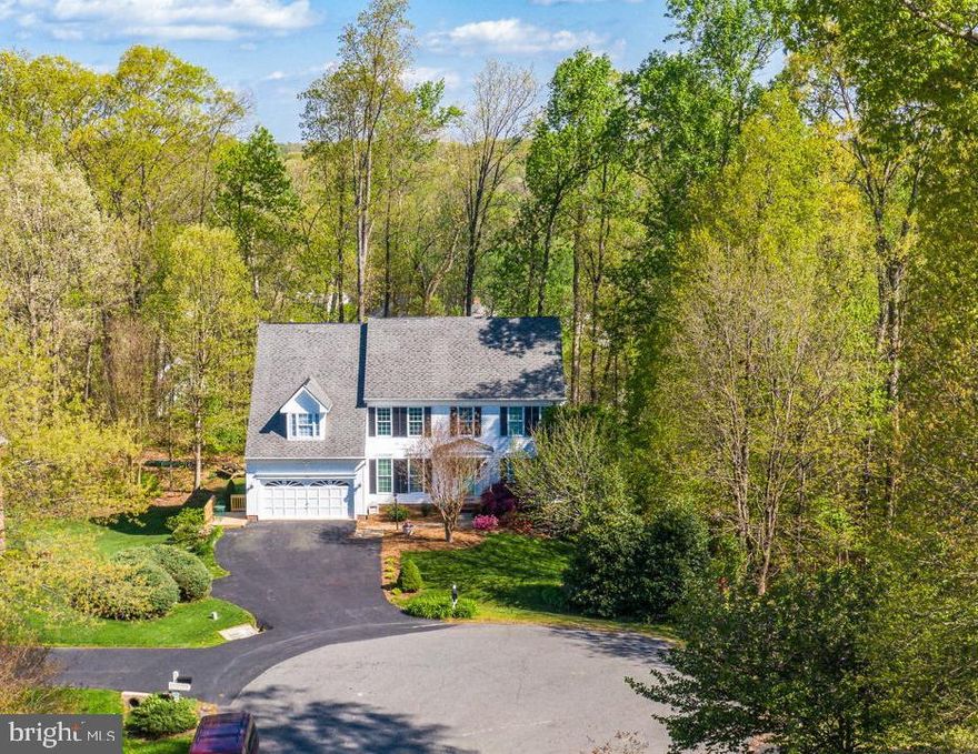 This Beautiful  5100 Square Foot Colonial house sits in a lovely cul de sac, and offers privacy and a quiet setting.  The 5 Bedroom 4 1/2 bath home offers multiple areas to entertain and live in. Walking in the front door we have the perfect room for a library or personal office to your left, to your right we have a sitting room which is right off the beautiful dining room with its large bay windows, ready for you to entertain. From there we go into the open floor plan of the kitchen.  We have 2 kitchen islands, one with a stovetop and the other with a sink and enough seating area for breakfast time and/or enjoying a glass of wine while cooking and having friends over.  Lots of large windows with great views of private rear yard and trees.  we also have a great deck right off the kitchen with plenty of sitting area for your BBQ and warm night dinners. On the other side right by the kitchen, we have the large screened-in porch with enough room for a table for 8. The fan in the room will help with warmer night and keep a cool breeze going.  There is a large mudroom right next to the garage and also a family room with a gas fireplace, mantle, and 2 beautiful ornate rounded windows.  The upper level showcases 4 bedrooms and 3 full bath & laundry room. The Master bedroom has 2 walk-in closets and a sitting area, The 2nd bathroom is a Jack & Jill set up, with a modern glass shower & custom tile work, 3rd full bath has separate shower and tub. The upper level/finished attic is a sweet surprise with the full bath and closet space.  A perfect room for a teenager wanting privacy and wonderful window views of the garden/yard. and tall ceilings. The house has a  large finished basement with loads of storage and an efficiency kitchen ( refrigerator ) There are 2 brick patios, and 2 doors into the garden from the basement, both walk out. This is the place where the game nights will take place and/or kiddos sleepover .  Plenty or large windows and nice and bright for family to hang out.  There is also a nice large built in storage area accessed from the outside.  This is a  golf community with community pool as well.  close to  the new VRE, Shopping &  HCA hospital.  The mature landscaping and neighbood is 15 min away from downtown Fredericksburg  for additional restaurant options and coffee shops.  Belvedere & Sneads farm is only 15 min away as well. Both great for family events.  A perfect location! Community Features: Basketball Court, there is one basketball court located at the North Community Center.The Lee's Hill Community is home to eight (8) playground areas. There is a large soccer/recreational field located on the North Side of the Community.There are two double Tennis courts in Lee's Hill. The volleyball court is located behind the tennis courts at the North Community Center. There are three separate walking trails in Lee's Hill. There are 2 Pools in the community!294 Sqft addition and deck added 1997Kitchen remodel 2006-cabinets, counter top, appliancesFinished third floor  1995 (full bath, bedroom with closet & windows )Finished basement 2000 New front windows and some rear windows 2016Two heating & cooling systems.  One zone each.  Upstairs system both heating and cooling replaced in 2018 New Hot water heater 2019Average heating bill is $110 per mo  Columbia GasAverage electric bill is $120 per mo  Rappahannock ElectricAverage water bill is $50 per mo.Home owners dues $206 per quarter includes trash pick up. Brand new carpet and hardwood flooring for 2020.