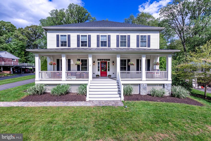 Exquisite modern farmhouse on a premium half acre lot in Little Vienna Estates. Luxury abounds in this 5 bedroom, 4.5 bath custom home. An entertainer s dream with an open foyer, formal living and dining room, family room, chef s kitchen with quartz countertops, a large center island, breakfast room and butler s pantry. The main level also features an executive library and mudroom with built-in cubbies and a dog shower. Luxurious owner s suite includes a sitting room, gas fireplace, dual walk-in closets and a spa bath with Carrera marble. Finished basement with recreation room, in-law suite, storage/workshop and exercise room.  Private and serene lot located on a quiet street with a deck, fenced yard backing to trees and front porch with a swing, perfect for sipping iced tea on a warm summer day. Oversized 3 car side load garage and three finished levels with 6,720 finished square feet. Built in 2013 with detailed trim work, recessed lights, oak hardwood flooring, and custom designer details throughout the main level. Zoned HVAC, surround sound system, and tons of storage. Convenient location with easy access to trails, parks,  downtown Vienna, restaurants, Metro, and commuter routes.