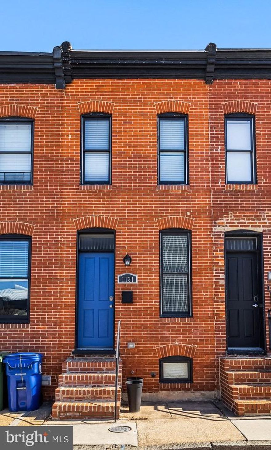 1131 Haubert St is a charming 2-bedroom, 2.5-bathroom home in the heart of Locust Point, offering a perfect blend of modern amenities and historic character. The main level features stunning hardwood floors and exposed brick walls that enhance the home's unique appeal. The gourmet kitchen is a chef's dream with custom cabinetry, sleek granite countertops, and high-end stainless steel appliances. A convenient half bath completes the main level. Downstairs, the basement offers ample storage space. Upstairs, both en-suite bedrooms boast generous closets and private bathrooms. The level is complete with a centrally located laundry closet. Step outside to the rear second-story deck, ideal for relaxing or entertaining. With its prime location, this home is just steps away from all the vibrant community amenities Locust Point has to offer.