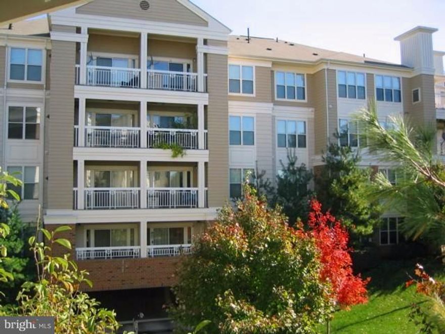 Top floor unit w/great views; upgraded kitchen w/SS appliances & upgraded cabinets; new paint; new H2O heater; Trex deck; marble surround gas fireplace; full size stacking washer & dryer inside the home; 3 closets in the Master Bedroom (1 is a walk in closet); excellent location - close to Dulles airport, shopping, major commuter routes and less than 1 mile from new Metro station to be built soon!