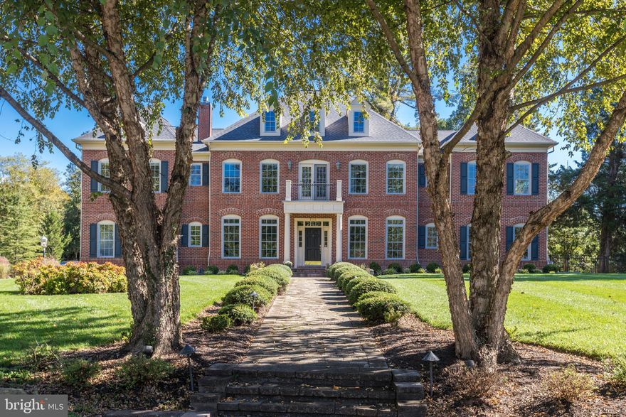 OPEN HOUSE CANCELLED. ACCEPTED CONTRACT. Turn key Stately Custom Colonial with over 8,000 sf of living space located on a beautiful 36,000 sf lot * Pride of ownership shows throughout * Main level bedroom and full bath. * Large open kitchen with breakfast nook, an adjoining family room with gas fireplace opening to a stone terrace with scenic views * The floor plan is excellent for entertaining large groups with circular flow or smaller intimate groups around the kitchen island * Luxury Owners Suite with sitting room, custom his & her walk-in closets and spa like bathroom retreat. Four additional bedrooms with en suite baths and a built-in desk area complete this level. The expansive lower level features a game room with full wet-bar, a large recreation room with gas fireplace, exercise room,  theater room and walk-up to rear yard.  Gorgeous outdoor stone fireplace and terraces, fully fenced private yard.  Just minutes to shopping and dining in downtown McLean, and easy access to all that Tysons, Arlington and Washington DC have to offer!