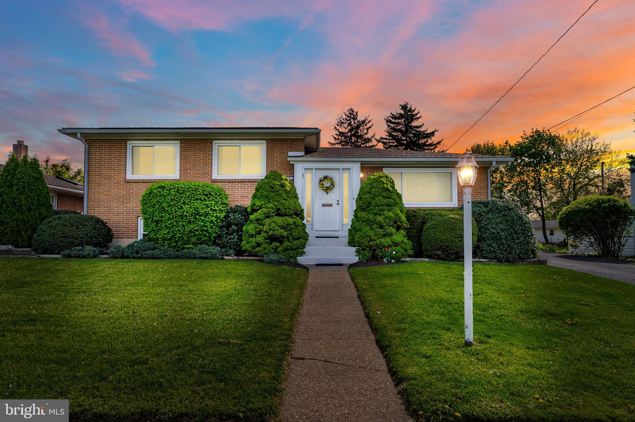 Welcome to this beautifully maintained, original-owner split-level gem in the sought-after Rutherford neighborhood. Built in 1960 and thoughtfully updated over the years, this spacious 4-bedroom, 2-bathroom detached home is bursting with charm, comfort, and functionality. The heart of the home is an expansive main level featuring a generous addition that seamlessly blends a sunlit dining area and cozy sitting room complete with a natural gas stove—perfect for gatherings or relaxing evenings. The kitchen is warm and inviting with ample oak cabinetry, a bright skylight, and a cozy breakfast nook. Gleaming hardwood floors add elegance to the main living room and upstairs bedrooms.
Upstairs, you'll find three comfortable bedrooms and a full updated bathroom, while the lower levels offer incredible versatility with a large family room, an additional bedroom, a second full bath, a recreation room, laundry area, and plenty of storage space. Step outside to a large deck with a retractable awning overlooking a beautifully sized backyard—ideal for summer entertaining or quiet morning coffees. This home has been updated with peace of mind in mind: shingle roof (2017), rubber roof (2018), updated electrical panel (2024), natural gas furnace (2012), AC and water heater (2016), and both bathrooms refreshed in 2019. This is a rare opportunity to own a lovingly cared-for home in a prime location—don’t miss it!