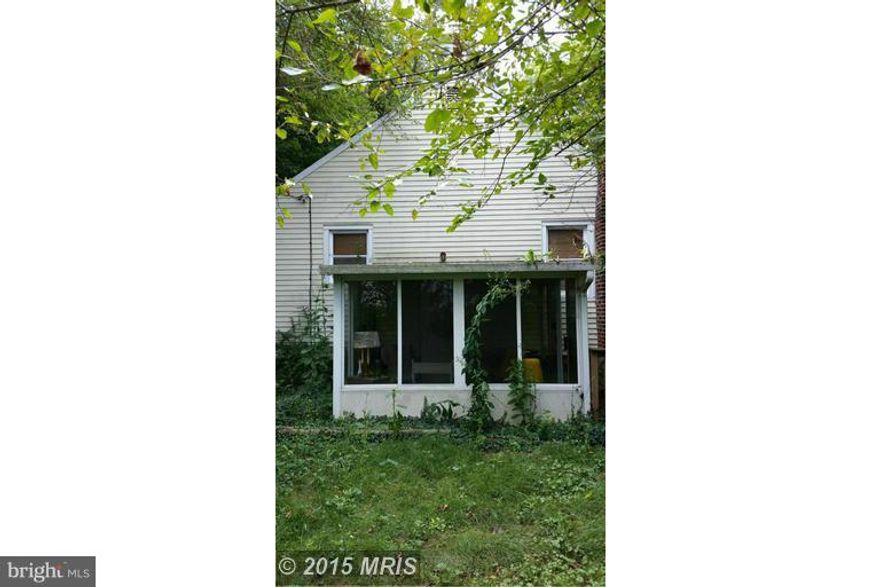 Back on the market.Contract fell thru. Adorable 3 bdrms, Cape Cod, hrdwd floors, door and window casings, glass closed in patio w/sliding door, 2 car det. garage with dug out for undercar access, was used previously as an auto shop. Plenty of storage, large yard with fruit trees and corner lot.Must see! Sold AS-IS.Inspect. for information purposes only, no inspec.conting. All offers wii be consid