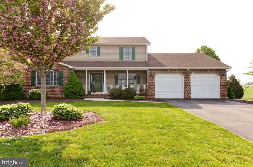 Spectacular 4 BR, 3 BA home on almost an acre on cul-de-sac, backing to a horse farm.  Slate and hardwood floors, main level BR with dual full bath access, large family room with brick faced, wood burning fireplace, large deck with newer canopy, inground 16 x 32 pool, oversized 2 car, attached garage, house is freshly painted!