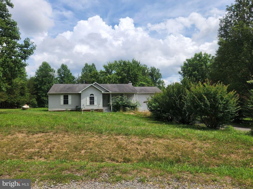 This 3 Bedrooms/2 Bath  Rambler is being sold "AS IS".  Great acreage and location. Perfect investment property for a flip. Stop by and see.