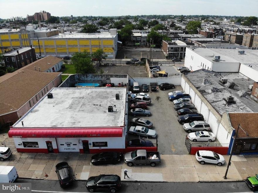 Prime Development Opportunity in Qualified Opportunity Zone – 12,980 SF Double Lot with CMX2 Zoning, parcels include 5532-5540 Chestnut St. Located in a thriving commercial corridor just west of University City, this remarkable 12,980 sq. ft. double property offers unmatched potential for investors or developers. The lots sit in a Qualified Opportunity Zone and is zoned CMX2, allowing for a wide range of commercial and residential uses. The existing structure currently houses a successful auto and tag shop, featuring: Two separate offices with private entrances,  a spacious auto service bay that accommodates eight cars, a secure rear lot with room for eight additional vehicles, three half bathrooms and an attached 22-space parking lot supporting business operations Strategically located near Penn and Drexel Universities, this site sits at the forefront of University City’s westward expansion. It’s highly accessible via public transportation, including the SEPTA Market-Frankford Line, and offers easy pull-in access from Chestnut Street. Surrounded by high-traffic national retailers such as Wendy’s, Rite Aid, Fresh Grocer, and Dunkin’ Donuts, all within a two-block radius, this site benefits from strong daily foot and vehicle traffic.Whether you're seeking a long-term investment, income-producing asset, or a major redevelopment opportunity, this rare parcel delivers on location, flexibility, and future upside in one of Philadelphia’s most vibrant and evolving neighborhoods. All showings must be made with listing agent. No showings during business hours.