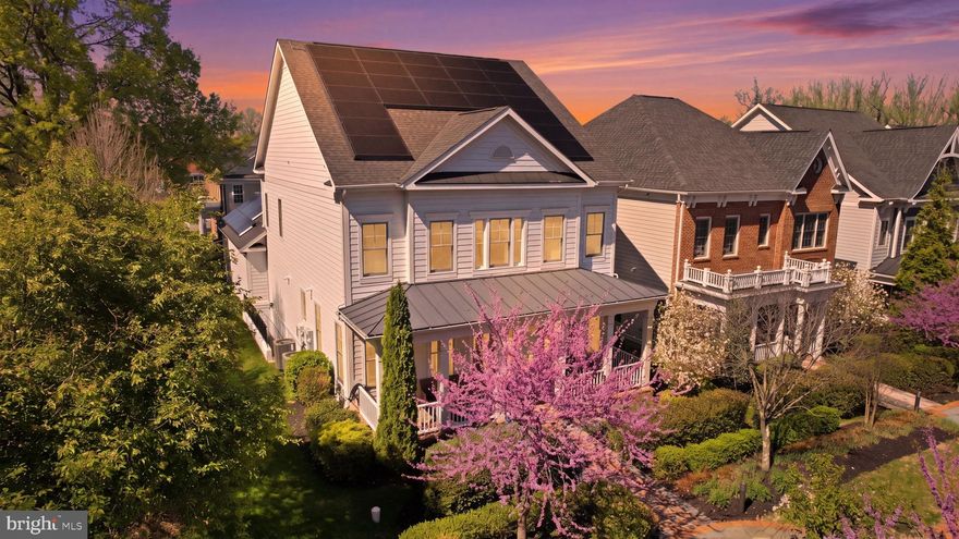 Welcome to 9123 Old Georgetown Rd — a truly exceptional luxury end-unit residence in the heart of Bethesda offering over 5,000 square feet of thoughtfully designed living space, 5 bedrooms, 4 full baths, 1 half bath, and more than $175,000 in premium upgrades. Perfectly positioned on a desirable end-unit lot, this stunning home seamlessly blends sophisticated design, cutting-edge efficiency, and everyday functionality.

From the moment you enter, you are greeted by elevated finishes, designer lighting, and meticulous attention to detail throughout. The main level showcases elegant open-concept living spaces ideal for both entertaining and everyday living. Two breathtaking Restoration Hardware chandeliers make a dramatic statement, while oversized windows flood the home with natural light.

The gourmet kitchen opens effortlessly to spacious dining and living areas, creating the perfect environment for hosting gatherings or enjoying quiet evenings at home. The enhanced powder room is a true showpiece featuring a custom accent wall adorned with fine imported tile from Spain — a luxurious detail rarely found at this level.

Retreat upstairs to expansive bedroom suites and spa-inspired bathrooms, all thoughtfully wired with electrical outlets for future bidet installation based on personal preference. The luxurious primary suite offers the perfect blend of comfort and sophistication.

The fully finished lower level was carefully curated to maximize lifestyle and entertainment. Enjoy a custom-built full bar where no detail was overlooked, a media room ideal for sports, movies, or music nights, and a spacious private gym complete with mirrored walls and upgraded 8mm rubber flooring.

This home also delivers exceptional efficiency and long-term savings with a fully owned Tesla solar system valued at approximately $53,000, along with an Ecos water softener and reverse osmosis filtration system. 

Located in one of Bethesda’s most desirable areas, this home offers unmatched convenience to downtown Bethesda, Pike & Rose, major commuter routes, Metro access, premier dining, shopping, parks, and top-rated schools. Luxury, functionality, location, and lifestyle all come together at 9123 Old Georgetown Rd — an extraordinary opportunity not to be missed.