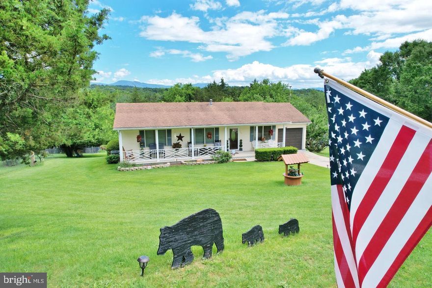 Private River access,  perfect for use of a short-term rental, permanent residence, or a 2nd home.  Charming Ranch Home with Inviting Porch & Beautiful Back Deck — Your Perfect Retreat! 🏡🌿 Mountain views in the fall and winter months!
Welcome to this stunning ranch-style residence that combines comfort, style, and nature's tranquility! Step onto the welcoming front porch and feel immediately at home as you enter into a spacious living room. The open-concept design seamlessly connects the living area to the kitchen and dining space, all featuring gorgeous new LVP flooring that creates a cohesive look throughout these main rooms. ✨
This charming home offers three cozy bedrooms, including a primary suite for your privacy & ultimate relaxation. The other two bedrooms are thoughtfully situated on the opposite side of the house, sharing a stylish bathroom — perfect for family or guests. 🛏️🛁
Imagine yourself unwinding on the back deck, where you can enjoy peaceful moments surrounded by nature. Whether you're hosting friends, enjoying a quiet evening, or sipping your morning coffee, this outdoor space is your own private sanctuary. 🌳☕  This property has  private community access to the Shenandoah River, that you can even hear from the back deck.  This part of the river is deep that is perfect for boating, fishing and more!  There are mountain views in the fall and winter seasons, giving the possibility of possible year-round views.   Recent updates include within the last 5 years, new HVAC unit!!  More recently there has been new flooring in the kitchen, living room and hallway, new flooring in the bedrooms and a new garage door!  This home is in excellent condition and is ready for it's new owners!  There are no short-term rental restrictions, so STR's are welcomed! Schedule your tour today!!