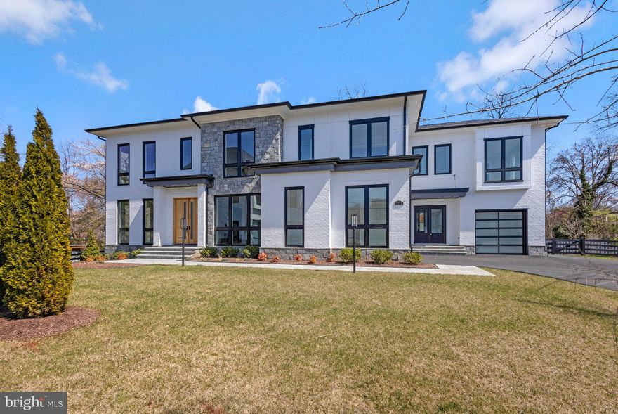 Call Showing Contact  For Appointment. This truly exceptional home is located in our luxurious community of Halls Manor, in one of the most desirable neighborhoods in Mclean. 13 min. drive to Georgetown in our nation’s capital.
 Nestled within a Serene Cul-de-sac you will find our impressive Waterford model on lot Bringing a pleasing blend of traditional and a host of modern amenities with sophisticated design elements. This 10,947 sq ft  (inside and outside living area plus garages) home features 6 bedrooms and 7.5 baths.
Setting the tone for a great first impression with 9ft Sapele Mahogany front doors. When you first walk in you are impressed with our 11 ft ceilings, This lends a very grand feel to the space. The 5 inch Solid American white oak floors set a beautifully warm feeling throughout the home. Our signature floor-ceiling windows offer plenty of natural light, to bring the outdoors inside. The Waterford has a cozy feel with our extensive trim package which includes 10 inch base boards, 8 inch crown trim and 5 ½ inch casing around the windows and door ways.
  The Main Level features a light-filled Family Room, Formal living room, Dining room &  main level suite with f/ bath. The suite has its own private entrance w/car garage. Our homes in Halls Manor feature an elevator to all 3 floors.
  The gourmet kitchen is outfitted with top-of-the-line Viking s.s. appliances.  The expansive area for meal prep also provides  room for storage and entertaining. There is a 6 burner range, custom door fridge, two dishwashers, two sinks, pot filler and beautiful two-tone custom cabinetry. Continuing in the kitchen we have a butler’s pantry with an additional fridge, a Miele Coffee machine and storage for all of your ingredients and snacks . 
The Main Level additionally Features a porcelain tile double sided fire place, butlers wet bar with a sink, beverage fridge, mud room and 3 car garage with epoxy flooring. 
One of the most breathtaking details of this delightful home is the owner’s suite with its own screened in porch, wet bar, sitting area and double sided fireplace. The luxurious owner’s bath features heated floors, steam shower, two toilet rooms, two walk in closets, one with its own island, and a spa like tub fit for a royal bath.
Enjoy 4 generously sized bedrooms on the Upper Level Including a bonus suite in its own secluded side of the home. All bedrooms feature a walk-in closet and on-suite bath. Continuing the upper level you will find a loft waiting for you to turn into an office, playroom, or upper lounge area.  The large laundry room comes with 2 washers and 2 dryers.  
As you make your way down to the lower living area, you will find a whole other world to explore. First you are greeted by an open floor plan space to make it your own. The lower level is equipped with a full wet bar with a stunning waterfall quartz island in a suede finish including a dishwasher, beverage fridge, ice maker and Microwave. Other features include a walk-up basement and lower-level exercise room. Enjoy a day at your own relaxing spa with sauna, steam shower and heated floors. You will also find the 6th bedroom w/full bath and walk in closet. Let’s not forget the tasting room separated by a beautifully done glass door, full of storage for all your wines and beverages. Outside the lower living level there is a full outdoor kitchen, fire table and a covered flagstone patio Beautiful trees provide privacy for outdoor entertaining. 
Outside of the family room is a covered porch with electronic retractable screens. Beautifully finished with James Hardy paneling w/ double sided fire place looking in to the family room.
Moving along with the upper outdoor space you will find a second full outdoor Kitchen with sink, grill, storage and Deckton counter tops. Next to the outdoor kitchen the lounge area with an outdoor fireplace, w/room for dining table and  seated gathering areas.  Please find us on the web.  Premier Homes Group.