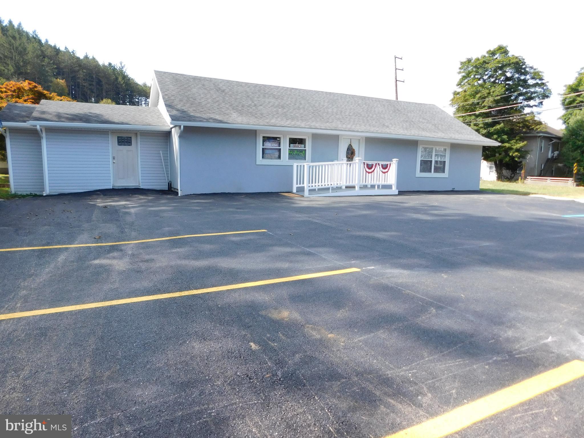 Rare office space rental opportunity in lovely West Penn on Route 443 corridor! The broad vestibule greets you and gives that modern feel. This space offers a Service Window to greet your clients with ease. The modernistic community kitchen can couple as a private conference area if needed. Completing the space is a 64 sf compliant bath. Abundant off-street parking. Central air conditioning and heat. Utilities and WiFi are included with the rent. Billboard space available. Make your mark in the growing Tamaqua area!
