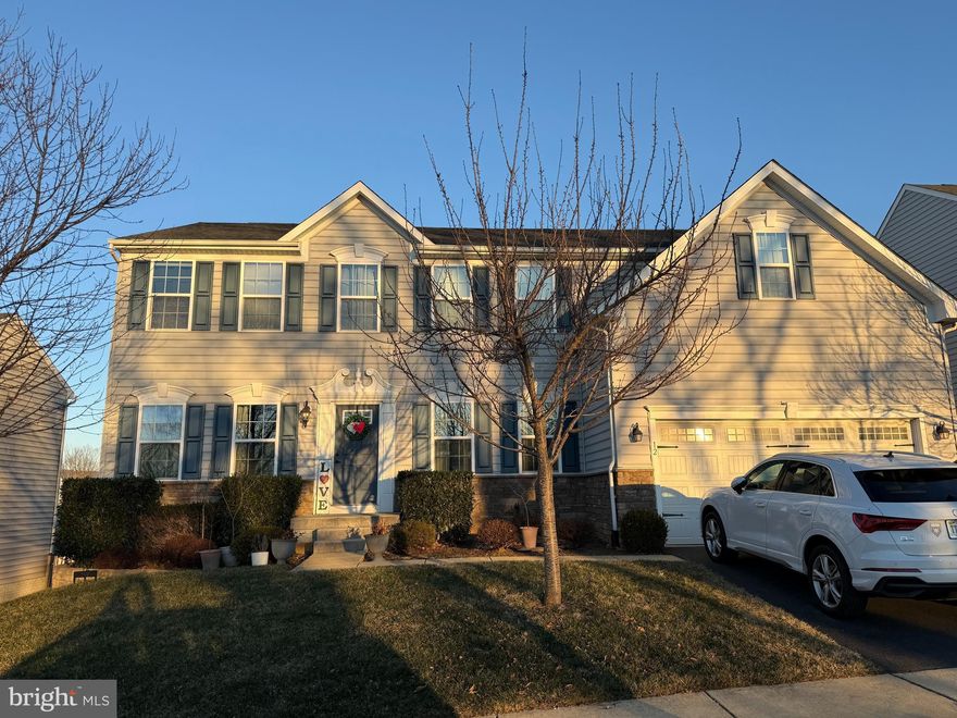 Welcome to 12 William Albert Way, a charming 4-bedroom, 2.5-bathroom Colonial-style home nestled in the desirable Lovettsville Town Center community in Lovettsville, VA. Built in 2016, this spacious residence offers 3,574 finishhed square feet of comfortable living space across two stories, plus a partially finished 1,280-square-foot basement ready for your personal touch—whether it’s a home gym, theater, or additional storage. Situated on a generous 0.21-acre lot, the property combines modern convenience with suburban tranquility in a car-dependent yet peaceful neighborhood known for its low noise levels and calm atmosphere.

Step inside to an inviting open layout featuring a bright and airy main level with a well-equipped kitchen, formal dining area, cozy family room, and convenient half bath. Upstairs, discover four generously sized bedrooms, including a primary suite with its own private bath, and a second full bathroom for family or guests. The home boasts quality construction with masonry exterior walls, a sturdy concrete foundation, and a classic gable roof, complemented by central heating and air conditioning for year-round comfort. A attached two-car frame garage (440 sq ft) provides ample parking and storage.

Outdoor living shines here with the recent addition of a large (16x20) Trex deck—durable, low-maintenance composite decking that’s perfect for barbecues, relaxing evenings, or entertaining friends and family while enjoying the private backyard. Located in vibrant Loudoun County, this home is just minutes from local shops, parks, and commuter routes, offering the best of small-town charm with easy access to nearby wineries, hiking trails, and the greater DC metro area.