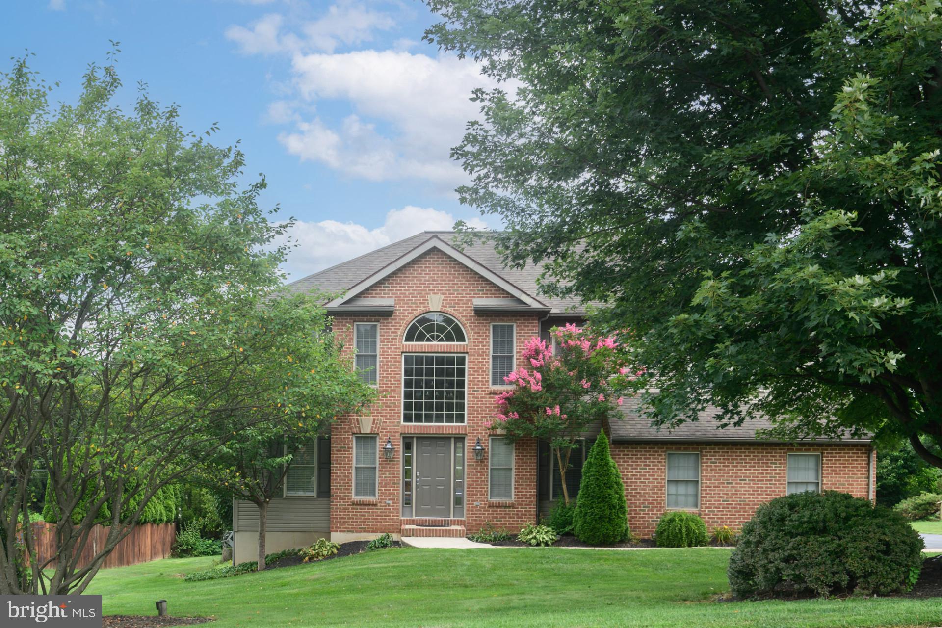 Welcome home to this beautifully maintained two-story in Manheim Township’s desirable Bloomingdale neighborhood. This home has efficient gas heat, new HVAC system in 2020, an oversized two car garage, and large maintenance free aluminum deck with a brick patio for outdoor entertaining. The first floor features an open floor plan and an updated eat-in kitchen with stainless steel appliances. Plenty of space with a first floor office, stunning custom gas fireplace in the generous living room, and a comfortable formal dining room. Upstairs you will discover a roomy primary suite with expansive bath featuring a whirlpool tub, oversized glass-wall shower, and bidet. All bedrooms have generous closets and the spacious second floor laundry room makes cleanup convenient! Downstairs is full of possibilities with a finished daylight basement including a home theater with stadium seating. Basement access opens out to additional storage and the backyard entertainment space. Nestled in a prime location, this home provides easy access to major highways, top rated schools, shopping, dining, parks, and more, making everyday living a joy.