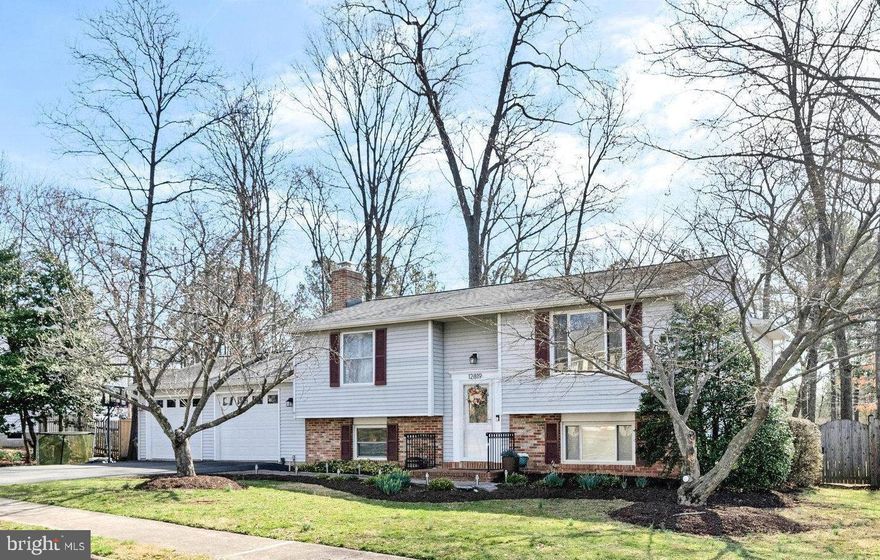 This move-in ready home is perfect for entertaining!  4 BR, 3 BA beauty features open dining and living, gorgeous sunroom, large deck over a fully fenced yard, luxury kitchen with pantry, and basement rec space, all tastefully redone in easy-to-customize neutral finishes.  Two main level and two downstairs bedrooms, three full bathrooms, and a .25 acre lot to enjoy.  Plenty of parking in your two-car garage, and a hidden storage space off the laundry.  All in highly sought after Fox Mill Estates, a beloved neighborhood close to retail, transit, bike trails, and all modes of transportation.  A great place to call home!