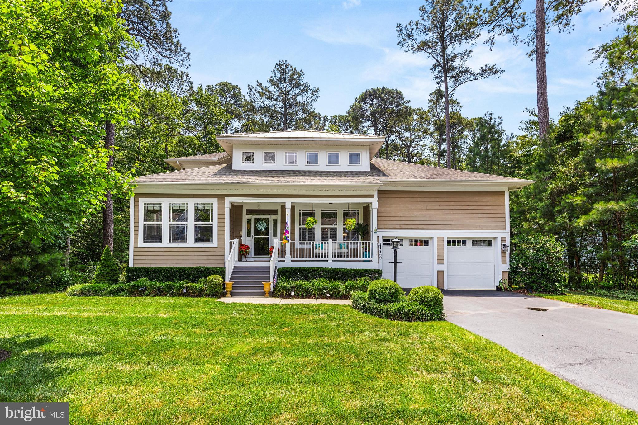 Welcome to this stunning 4,379 sq. ft. single-family home located in the highly sought-after gated community of Glen Riddle. Just minutes from the vibrant Ocean City nightlife, beaches, boardwalk, restaurants, and shopping. This meticulously maintained 5-bedroom, 4-bathroom residence features two spacious primary suites, including a first-floor owner’s retreat with dual finished walk-in closets and a fully renovated bathroom—complete with custom cabinetry, double sink vanity, oversized soaking tub, and a beautifully tiled walk-in glass shower. Designed for modern living, the open-concept floor plan boasts soaring vaulted ceilings with a stunning custom electric fireplace, a dedicated home office/den, and an abundance of natural light throughout. The gourmet chef’s kitchen is a true showstopper, featuring quartz countertops, tile backsplash, gas cooktop, double wall oven, pantry, and coffee bar. A sunny four-season room off the kitchen provides views of the private wooded backyard, creating the ideal space to relax or host guests. Step outside to your entertainer’s dream oasis—complete with a deck with a built-in hot tub, an expansive 28x28 concrete patio, a custom slate stone bar with a flat-screen TV, fire pit, and plenty of lounge space to enjoy warm summer evenings. Additional features include main-level laundry, modern finishes throughout, and plenty of room for family or guests. Enjoy resort-style living with Glen Riddle’s exceptional amenities, including a marina, clubhouse with community pool, gym and proximity to the world-renowned Glen Riddle Golf Course and Ruth’s Chris Steak House—just a short bike ride away. Don’t miss this rare opportunity to own a luxurious home in one of the Eastern Shore’s premier communities!