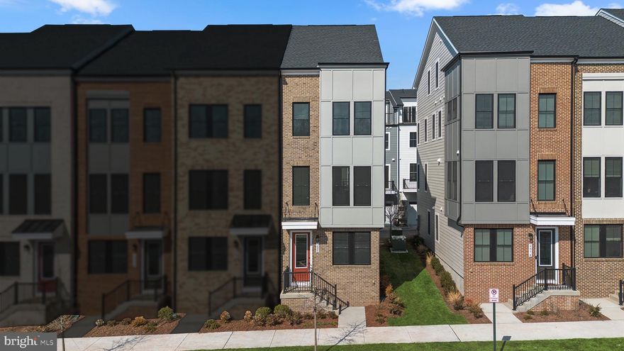 Discover the Tatum 16-R1-RT – Homesite 140 at Arpina Valley by Van Metre Homes in Herndon, VA—a one-car, rear-load garage END TOWNHOME with three bedrooms, three full bathrooms, and two half bathrooms ready for you to move in IMMEDIATELY! Purposeful and polished, this floorplan balances comfort and functionality, featuring a rec room for casual entertaining, a balcony off the great room for a breath of fresh air, and a primary suite with dual walk-in closets for elevated living everyday. The upper level roof terraces expands your living space offering a private outdoor retreat. Offering an impressive 2,055 square feet spread across four levels, this stunning residence welcomes you with an inviting open floor plan highlighted by 9' ceilings and luxury vinyl plank flooring in the main living areas, rec room, and primary bedroom. At the heart of the home separating the dining room and great room, the spacious premier kitchen awaits, a culinary haven, complete with a kitchen island, upgraded soft-close cabinets, quartz countertops, tile backsplash, and stainless-steel appliances. Venture to the upper level and discover an indulgent primary suite boasting dual walk-in closets and a spa-like 4-piece luxury bathroom with an oversized, frameless shower with a built-in seat, double sinks, and a linen closet. This level also hosts an additional bedroom, a full bath, and a well-placed convenient laundry room. But the luxury doesn't end there. Ascend to the top level and be captivated by a bedroom suite complete with an adjoining full bathroom and a private roof terrace, an ideal space for effortless entertaining of family and friends. On the ground level, discover a welcoming foyer with a multipurpose rec room with half bathroom and easy internal access to the large finished garage! Additionally, the finished garage includes an electric vehicle charging circuit, and the home is solar-ready—designed to support future energy-efficient upgrades. Being a new build, your home is constructed to the highest energy efficiency standards, comes with a post-settlement warranty, and has never been lived in before! Take advantage of closing cost assistance by choosing Intercoastal Mortgage and Walker Title. Make your move now. Schedule an appointment today! -------Discover the allure of Arpina Valley, a new townhome community in Herndon that exceeds all expectations. Designed for modern convenience and commuter-friendly living, Arpina Valley connects you effortlessly to Route 28, the Dulles Greenway, and Dulles International Airport—ensuring you’re well-connected to everything Northern Virginia has to offer. Thoughtfully crafted floorplans provide flexible living spaces for your lifestyle, while community amenities invite you to relax, connect, and thrive. Embrace a lifestyle where new adventures are always within reach, and make Arpina Valley your gateway to exceptional living. -------*Other homes sites and delivery dates may be available. Pricing, offers, and availability are subject to change without notice. Images, renderings, and site plans are for illustrative purposes only and may not reflect actual homes or features. Some images and renderings may depict interior designs created in collaboration with AI or may represent a similar home. Additional terms and conditions may apply. Please see a Van Metre Sales Advisor for details.