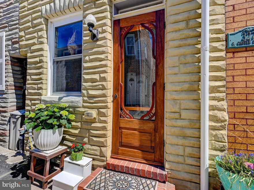Wonderful architect-designed home on charming street in Upper Fells Point. This home is exceptional. Light moves through both floors to double French door opening to a courtyard on the main floor and a Juliet balcony upstairs. The lovely mahogany front door greets and welcomes you into the living room that leads to a modern gourmet kitchen. Off the kitchen is the first floor powder room and a bonus space for a dining room, office, den, or whatever you need. From this space you head out the French doors to the brick courtyard with a hot tub!  Upstairs you will find two spacious bedrooms on opposite ends of the house. The front bedroom has a walk-in closet and the rear bedroom overlooks the courtyard and a hundred year old Magnolia Tree. There is an upstairs laundry and a large full bath with walk in glass enclosed shower and a separate curved soaking tub. This home is an easy walk to John’s Hopkins Medical Campus and ideally located just blocks from the Harbor Boardwalk and Patterson Park. Many restaurants are nearby: Charmed Kitchen, La Barrita, Little Donna’s, and Johnny Rad's Pizza to name a few. Walk to the Saturday farmers market and local shops in the heart of old Fells Point. 2 leased parking options available 1-2 blocks away. Brand new roof April 2026.