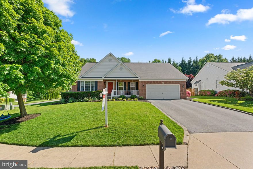 RARE OPPORTUNITY IN STONE MANOR! TWO COMMUNITY PLAYGROUNDS - WALKING PATHS - OPEN SPACE! Welcome to 1211 Millstone Ct; a tastefully updated one level home with over 4,000 square feet of living space. This brick-front rancher is gorgeous inside and out; from the covered front porch, to the composite rear deck, to the flat/cleared rear yard, this home will impress as soon as you pull into the asphalt driveway off of the quiet court. This home is going to work well for the buyer who values an established neighborhood with a true community feel. The home itself is updated, trendy, and shows off the modern finishes that today’s buyer expects. Move-in ready from day one this property provides an opportunity to simply move in, unpack, and enjoy. A massive lower level, 100% of the footprint of the main level, provides an incredible layout to play, work, add rooms, or customize an entertainment space. **KEY FEATURES/HIGHLIGHTS/DATES** Excellent condition throughout; move-in ready from day one -- Updated light fixtures -- Updated hardware -- Renovated primary bath -- Updated kitchen w/ stainless steel appliances -- Kitchen island -- Breakfast area w/ pantry --  LVP floors -- Fresh carpet 2024 -- Freshly painted garage 2024 -- Vaulted ceilings -- LED Recessed lighting -- Professional window coverings -- Gas fireplace -- Main level laundry -- Updated washer/dryer -- Great mudroom/transition space -- Massive basement w/ rough-in for full bathroom -- Insulated foundation -- Walk-up to rear yard -- Covered front porch -- Composite deck -- Full HVAC replacement 2023 -- Natural gas available -- Mature/diverse landscaping -- Flat/cleared yard -- Premium location on cul-de-sac -- Two community playgrounds -- Community walking paths -- Community sports fields -- Walking distance to Liberty High School and Freedom Elementary School -- Well-maintained homes and yards -- Private setting with easy access to local attractions and commerce -- Less than one mile to Home Depot, Kohls, HomeGoods, Michaels, Safeway, Chick Fil A, Kismet Cafe, Sushi-Q, Five Guys, Merritt Athletic Club, and much more!