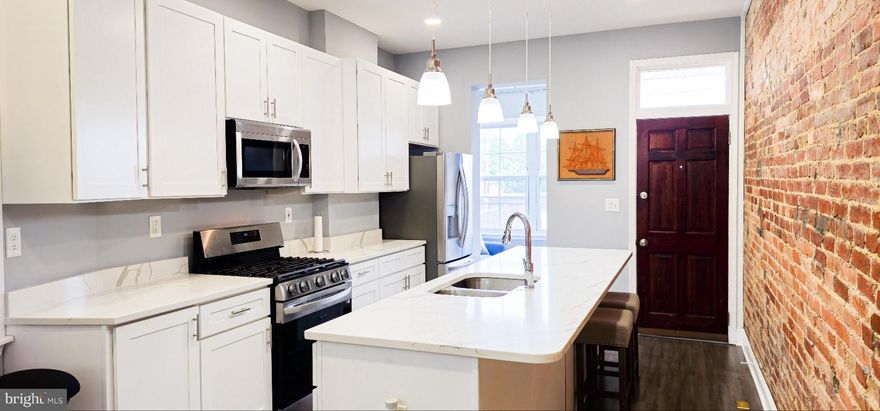 Your Big Happiness Awaits in Charles Village!

This lovely townhouse underwent a comprehensive renovation between 2022 and 2023, meaning you can enjoy a fresh, modern feel with minimal upkeep.

//Two HVAC systems//
A hot water heater//
Roof//
Gorgeous white cabinets//
sleek stainless-steel appliances//
elegant quartz countertops//
beautifully updated bathrooms//
Stunning LVT floors//
cozy electric fireplace//
modern recessed lighting//
A balcony//
Clean basement space for convenient laundry and storage//
Fenced back-yard, the perfect spot for entertaining friends and family//
Local parking permit for parking just in front of the house (New owner should apply for it)//

Imagine the ease of city living in this beautiful 4-bedroom, 2.5-bathroom townhouse nestled in the heart of vibrant Charles Village. 

Easy Parking! You can park just in front of the townhouse; it's residents only parking area. 

- Just 11 mins stroll from the Johns Hopkins University (JHU) main campus.

- 30 seconds to JHU shuttle stop, and city bus stops practically at your doorstep, convenience is truly key. 

- Plus, you'll find yourself in close proximity to Baltimore Penn Station, grocery stores, and bustling business areas – everything you need is within easy reach!

Step inside and discover a home that blends modern style with comfortable living. 

The top floor unveils a luxurious Master Suite, your personal sanctuary completes with a spa-like en suite full bath featuring a relaxing soaking tub and separate shower. 

Picture yourself unwinding after a fulfilling day with a warm bath and serene city views. 

A double vanity ensures smooth mornings, even during the busiest of times.

Don't miss this incredible opportunity to embrace a vibrant lifestyle in a meticulously updated townhouse. 

Come and experience your big happiness in Charles Village!