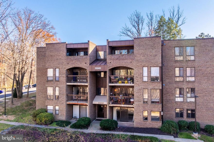 Experience Reston living at its best in this beautifully maintained 2-bedroom, 1.5-bath first-floor condo in Chestnut Grove—where ALL utilities are included and nature, convenience, and comfort meet seamlessly. Step inside to a bright, open floor plan featuring a light-filled living room, a separate dining area, and a versatile breakfast room perfect for a home office or reading nook. The home boasts multiple updates, including a new HVAC system (2022) and a gas stove, plus fresh paint in 2023. The spacious primary bedroom includes a walk-in closet, while the second bedroom offers a generously sized closet. Additional storage is found in the coat closet, linen closet, and in-unit stacked washer/dryer. Enjoy peaceful, tree-filled views from your covered patio, accessible directly from the living area—ideal for morning coffee, relaxing after work, or simply taking in the serene surroundings. The unit’s flat, one-level layout, carpeted floors, sliding glass doors, and natural light make everyday living comfortable and easy. Chestnut Grove is part of the Reston Association, granting you access to an incredible amenity suite: community pools, tennis courts, basketball courts, playgrounds, picnic areas, and miles of wooded walking paths. The community’s own amenities include additional tennis courts, a swimming pool, basketball court, playground, picnic areas, and storage. The location is unbeatable: just one block from the W&OD Trail, with a connecting path to Lake Fairfax Park. Walk to the Wiehle–Reston East Metro (Silver Line), or take a quick drive to Reston Town Center, grocery stores, shops, restaurants, and fitness studios. Commuting is effortless with easy access to the Dulles Toll Road, Rt. 7, Rt. 28, and Dulles Airport. Best of all—ALL utilities (electric, gas, water, sewer, trash/recycling) are included, and you’ll have three parking spaces (one assigned spot & 2 permanent visitor tags) . This is true low-maintenance, lifestyle-first Reston living—available now.