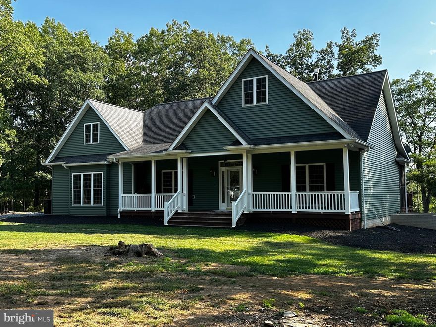 Sitting in the Forest Glen community, this home stands out with it's stunning curb appeal.  The inside features a bright open floor plan, with an abundance of natural lighting provided by many oversized windows & doors.   Hardwood Flooring flows throughout the entire home.  Homeowners will enjoy a kitchen that’s centered around the living room, dining area, and screened back porch. The open kitchen is complemented by a breakfast nook and beautiful maple cabinetry.    The custom details throughout truly make it something special.  The primary suite is a peaceful retreat with a large walk in closet and spa like private bath. This bedroom has a glass door that opens up to the deck  to extend the enjoyment of the quiet setting.  The attached 2 car garage includes a washroom to clean up from all those outside dirty jobs.  The home sits on 2 lots in this established neighborhood, on a no thru street.  With a large open kitchen, oversized living area with gas fireplace, spacious bedrooms and closets, and a large bonus room — what’s not to love about this home?  You will never want to leave home.  If you "have to", it's only a 5 min drive into Moorefield.  Call today for a showing of this property.