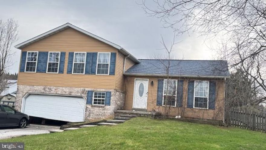 This split-level detached home in Whispering Meadows offers significant investment potential. Built in 1991, the property features a basement with walkout access. The traditional floor plan includes a country kitchen with built-ins and a dedicated dining area. A cozy fireplace adds charm, while the outdoor deck and patio provide excellent spaces for entertaining or relaxation. The 0.28-acre lot is landscaped, offering curb appeal and potential for outdoor enhancements. While the home requires major rehabilitation, this presents an opportunity for investors or owner occupant with vision, to customize and increase property value significantly. With a total finished area of 1,768 sq. ft. , the potential for rental income or resale profit is available.  Don't miss this chance to invest in a promising property!