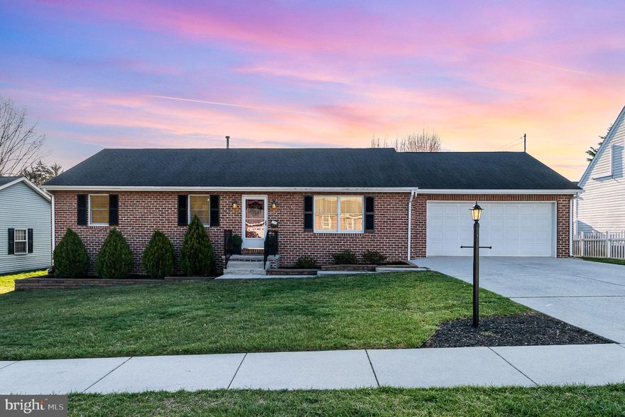 This brick rancher has been beautifully updated and is located close to shopping and restaurants.  Step into the big living room with built-in wall unit and double window letting in lots of natural light.  You will fall in love with the eat-in kitchen with lots of granite countertops and tons of cabinets for storage.  There is even an eat at peninsula and a built in desk!  Sitting off of the kitchen  is a big sun/Florida room with 2 ceiling fans and countless windows letting in all of the sunshine.  The 1st floor laundry room makes this chore a lot more convenient.  3 nice sized bedrooms and 1.5 baths finish up level.  The lower level has a big rec/family room plus another room that you can use as an office, gym, hobby room, or even as a guest room.  Out back there is a big covered patio and deck that overlooks the big level yard that is partially fenced in.  2 car attached garage and off street parking makes parking a breeze.  Hurry, you don't want to miss this beauty!