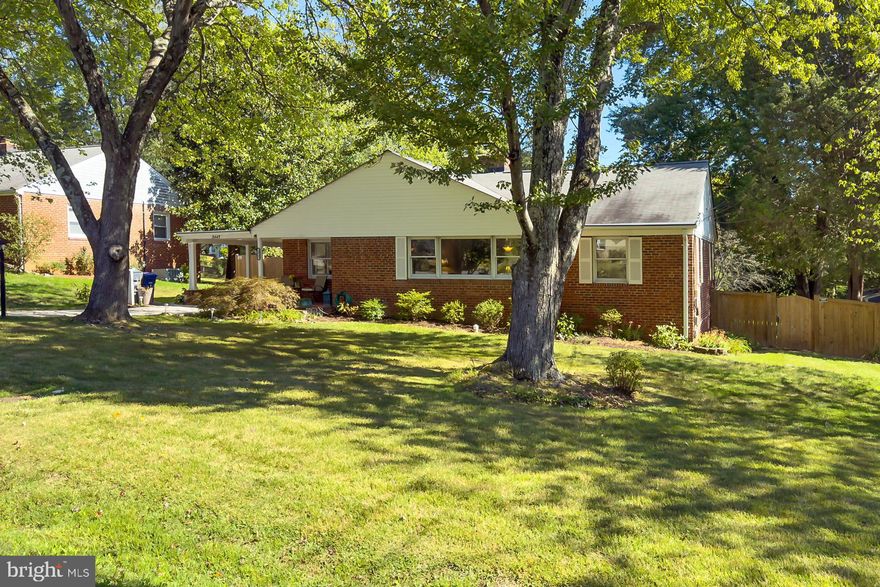 Welcome to one level living at its finest! Situated on an incredible lot in Falls Church, you will be wowed with how much space is in this updated home. Come in through the inviting front porch, perfect for morning coffee and be greeted with newer flooring through the entire home. As soon as you enter, the natural light will draw you in. The huge living room features an over-sized picture window, gas fireplace and crown molding. The separate formal dining room is great for entertaining and flows to the expanded and updated kitchen. Beyond the kitchen is the convenient laundry closet with modern washer/dryer plus ample storage solutions. The primary bedroom boasts spa-inspired bath showcasing decorative tile and chic fixtures. The two additional bedrooms are bright and have easy access to a stylishly updated hall bath. The pull down attic is ideal for extra storage. Make your way to the fenced back yard and enjoy your own oasis. A large flat space for all to play. The huge gardener’s shed is great for all your toys and tools. The ease of indoor/outdoor transition is unmatched in this area. And the location of this home can’t be beat! Walk through the park trails to 2 swim clubs. Shopping centers, supermarkets, and restaurants are minutes away. Easy access to the Seven Corners Transit Center with direct Metro Busses to EFC Metro, Ballston Metro, Vienna Metro, Tysons Metro, and direct connections to the rest of the Metro system. MetroBus less than a mile!