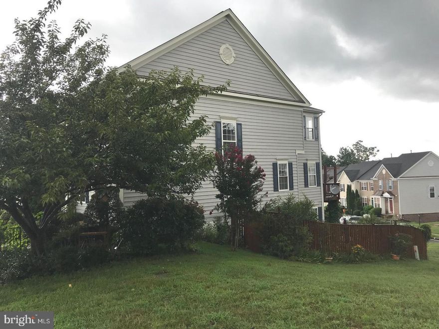 Over 2,250 finished sq ft **Beautiful End unit in great condition**Hardwood on main level**Open floor plan**Deck off rear kitchen**Fully finished basement is walk out level**Gas fireplace**Amazing landscaping is a gardeners paradise**Highly sought after lake ridge community***Just mins to 95 and Potomac Mills**Walking trails along the Occoquan River directly behind this community***ONE UPSTAIRS BEDROOM CARPET BEING REPLACED NEXT WEEK