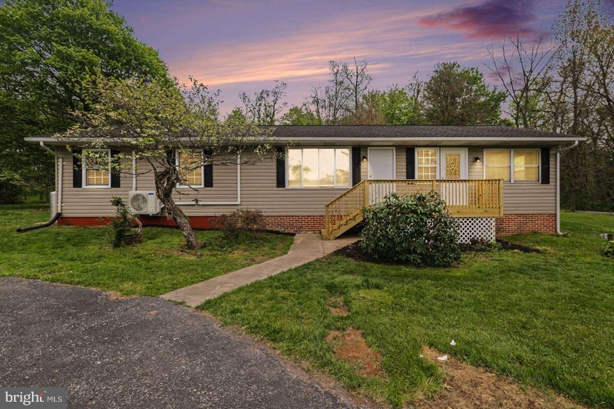 This beautiful single floor rancher has been thoughtfully updated to provide contemporary comfort and style throughout. Step into an airy, inviting living space. The kitchen has all new appliances, granite counter, new cabinets, and propane gas stove. Located in Franklin Township Dillsburg, this 1750+ Sq Ft 3 bed 2 bath one floor sits on a spacious 1.48-acre lot. Beautiful views of the countryside just off Rt 15. A large rear deck to relax and enjoy the great views and entertain guests. Inside you'll find gorgeous modern home with a modern up to date feeling. Warm inviting living room with an electric wall mounted fireplace. A conveniently located laundry room. Two bedrooms on the right side of the house with to the left one large Master-Primary bedroom with its own bathroom and a huge walk-in closet. This home boasts a large commercial sized garage making it an excellent opportunity to for home bases business or workshop. Zoned as “Open Space” to create a personalized haven in a serene location. With on-lot well and sewer, new luxury vinyl plank flooring, new carpet in bedrooms, and updated bathrooms, this home is perfect. You will love everything this gorgeous home offers – see it before it’s gone!