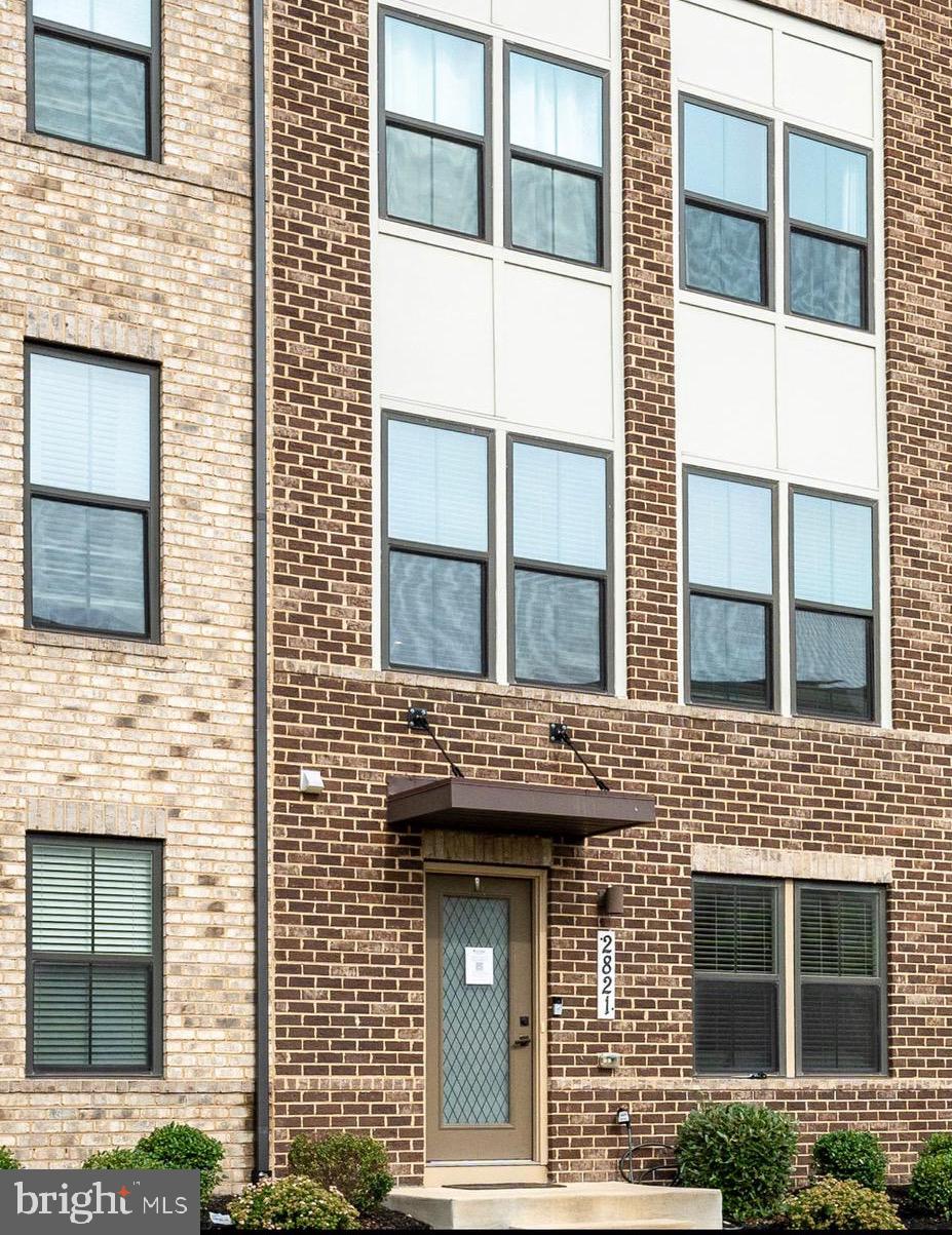 Welcome to this beautifully maintained 3-level townhouse located in the highly sought-after Village of Town Square—just a short walk to the Suitland Metro! This spacious 4-bedroom, 2.5-bath home is loaded with upgrades and stylish finishes throughout.
Step inside to 9-foot ceilings, rich hardwood floors, and elegant crown molding throughout the entire home. The entry level features a welcoming foyer, a powder room, and a versatile office/den (or optional 4th bedroom) with French doors and a generous storage closet. Direct access to the attached two-car garage adds everyday convenience.
The second level offers a bright and open layout perfect for both daily living and entertaining. The gourmet kitchen boasts an oversized island, stainless steel appliances, recessed lighting, pendant lights, and hardwood floors that flow seamlessly into the dining area and living room—all enhanced by classic crown molding.
Upstairs, the spacious owner’s suite includes a large walk-in closet and a spa-inspired bath with double sinks, a separate shower, tile flooring, and crown molding. Two additional bedrooms, a full guest bath with tile, and plush carpeting complete the third level.
The current HOA fee is $249/month and includes Verizon Fios cable, fiber-optic gigabit internet service, and landline.
Community amenities include a playground, sand volleyball court, horseshoe pits, outdoor exercise equipment, and a dog park—designed to enhance your lifestyle.
Enjoy close proximity to National Harbor, downtown D.C., and the Alexandria waterfront—all within a 20-minute drive. This home combines timeless features, an unbeatable location, and exceptional value in one of Prince George’s County’s most desirable communities. Don’t miss your opportunity to make it yours!