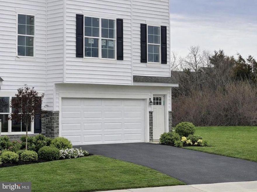 MASSEY ELITE END UNIT- Late Spring Move-In! 3 bedrooms, 2.5 baths, 2 car garage. Approx. 2380 SF! 12x10 Deck. This home features a Finished den, 42" cabinets in kitchen, island, stainless gas range, dishwasher, microwave, LVP flooring and recessed lighting in Kitchen. LVP floor and Tile Shower surround in master bath. 3 pc rough in walk out basement. Don't miss out on this spectacular floor plan! Builder Splits Transfer Tax. 
Beautifully appointed end unit townhome featuring 3 bedrooms, 2.5 baths, and approximately 2,333 square feet of living space. This home includes a 2-car garage and a 12x16 deck overlooking open farmland. Interior features include upgraded luxury vinyl plank flooring throughout the main level, a gourmet kitchen with granite countertops, Level 3 cabinetry, a large center island, and a gas range. The primary suite offers a spacious layout with a walk-in closet and private bath. Located in one of the community’s most desirable settings with no building in front, open space surrounding, and ample parking.