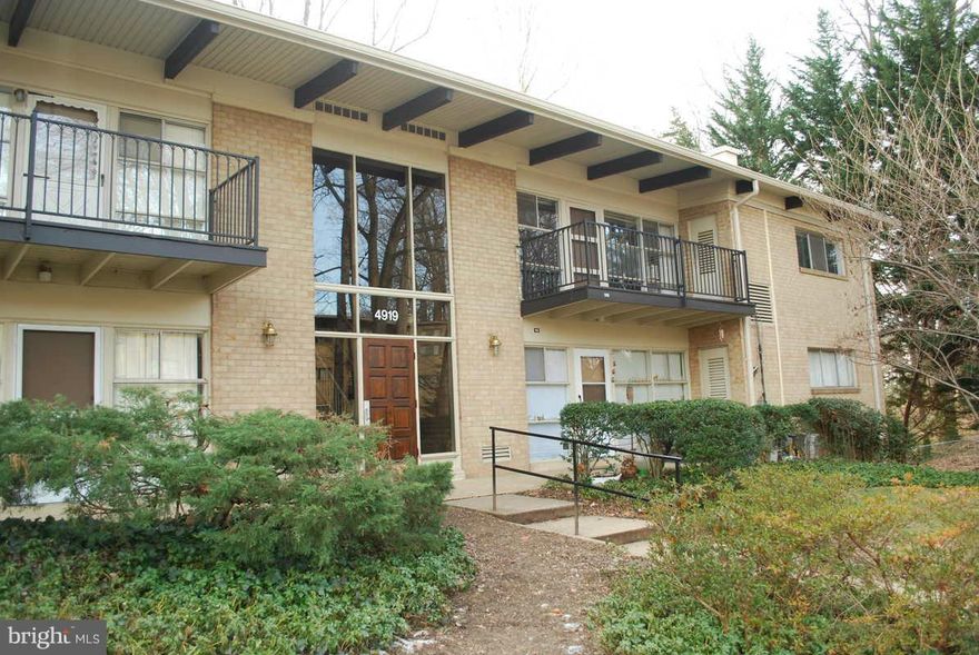 Rarely available 3 bedroom, 1.5 bath unit with walkout rear patio and entrance.  Light filled, new updates include hardwood floor, updated kitchen with granite and updated appliances, updated windows, fresh paint,...  Storage and laundry just steps from front door;  parking for 2 vehicles; Condo fee covers gas, water/sewer, Great value and  move in condition!!  close to shopping,