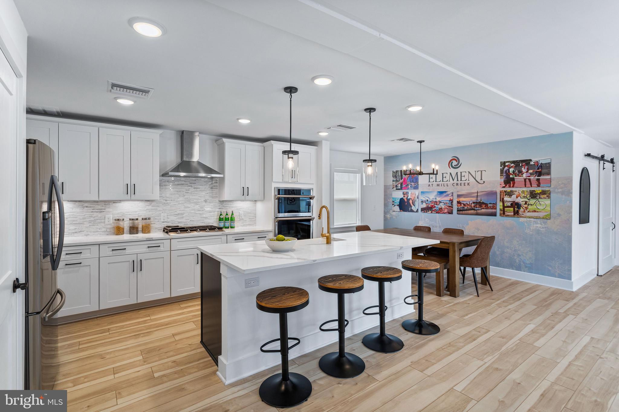 FINAL 3-BEDROOM IN FIRST BUILDING AT ELEMENT AT MILL CREEK! Amazingly spacious, light-filled corner unit overlooks forest conservation! Garage parking space and storage unit included! New amenity-rich 55+ community conveniently located near Rt. 50, minutes to downtown Annapolis, waterfront dining, shopping, Sandy Point & Bay Bridge. Must See!