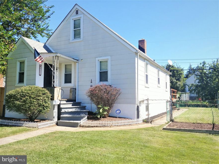 Lovely renovated home within walking distance to Burdick Park and the New Burdick Dog Park**Home features a basement In-Law Suite** which has a Family Room, Bedroom, Full Bath and Kitchen. In-Law Suite is accessible from both it's own covered outside entrance and from inside stairway. Home has had New Carpeting installed and has been Professionally Painted.  Large Eat-In Kitchen with a separate Dining Area. Bedroom and Bath on Main Level. Upstairs could easily be 2 Bedrooms. House has been Professionally Cleaned and Move-In ready.  Large, level, fenced yard and Huge deck for outdoor entertaining. Plenty of Parking. Put this one at the top of your Must See list!