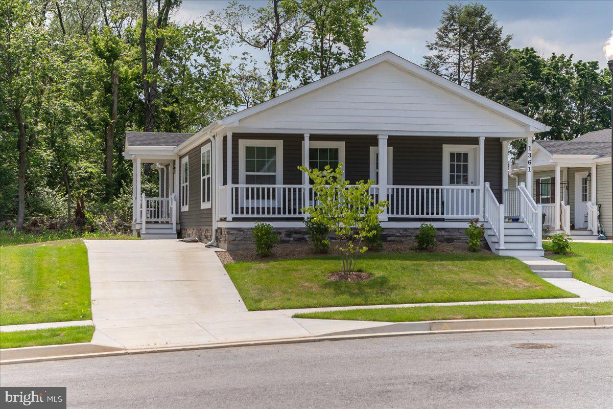 Brand new construction and convenient one level living. This home features a full covered front porch and full covered rear porch to enjoy the outdoors no matter what the weather. The porches are maintenance free, being constructed of composite flooring and vinyl railings and columns. The concrete driveway offers parking for 2 vehicles and has access to the homes side entrance. Step through the front entry door and you'll find yourself in a convenient mud room, making it easy to remove shoes and coats before entering the main home. The mud room also includes built-in cabinets, storage shelving and a laundry area.
The homes open floor plan offers views across the entire kitchen, dining room and living room, making this an awesome floor plan for entertaining. The equipped kitchen offers a tile backsplash, stainless steel Whirlpool appliances, LED recessed countertop lighting, center island with 3-person breakfast bar, and plenty of counter and cabinet space for storage. The adjacent dining area seats 6 to 8 comfortably. The spacious living room measures 13 x 21 and offers plenty of space for large sectional seating and flat screen TV.
The primary suite is located at the front of the home and separated from the other 3 bedrooms, which are located at the rear of the home. The primary suite offers crown molding, carpet, walk-in closet, LED lighting, and access to a luxury primary bath. The primary bath features an oversized vanity, walk-in double sized shower with built-in seating and vinyl plank flooring.
Back the hall you'll find the other 3 bedrooms in the homes, each offering sizable closets, LED lighting, and wall-to-wall carpeting. These bedrooms share a common hall bathroom complete with tub/shower combo, single vanity and multiple built-in cabinets for storage.
This home sits on a concrete block foundation with stone surround to grade, and vented crawl space. The home’s location offers easy access to I-81 & I-70, major shopping and dining options, located within walking distance of area schools, and is just a few blocks to the popular downtown Hagerstown Arts & Entertainment District. Plans for Kilpatrick Woods include a clubhouse and other amenities as this community continues to grow. There are other new homes available in this community in addition to this home. Contact listing agent for details and pricing.