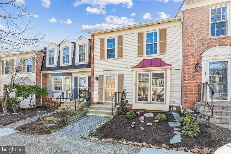 Welcome to 4323 Gypsy Ct, a meticulously maintained townhome nestled in the highly sought-after Loft Ridge community. This residence seamlessly blends modern updates with classic charm, creating an inviting and comfortable living space within a serene wooded setting.

Conveniently located along the intersection of main commuter roads, including I-95, 395, and 495, this home offers easy access to Arlington, DC, multiple military bases, and two major airports. Public transportation options, including bus and Metro, are nearby, along with main commuter roads. Assigned parking and ample guest parking are available right in front of the home.

Upon entry, the freshly painted interior exudes crisp elegance. The well-designed kitchen features expansive granite countertops, ample storage, under-cabinet lighting, and newer appliances, providing a contemporary culinary experience. A bay window in the front fills the space with morning light, perfect for enjoying your coffee. The kitchen flows into a spacious dining room and a bright living room at the back, offering serene wooded views. Sliding doors lead to an expansive deck, ideal for outdoor entertaining and relaxation. Along the main hallway you will find a private powder room and a convenient coat closet at the front door.

Upstairs, the recently updated stair flooring leads to three well-appointed bright bedrooms, each with newly installed ceiling fans. The main bedroom boasts a renovated ensuite bathroom with a large shower, while the other two bedrooms share an updated modern family bathroom.

The basement walkout level offers ample storage with fitted cabinets, a powder room (with potential for expansion to a full bathroom), and a large mechanical/laundry room with additional storage options. The recently expanded recreation room features a cozy wood-burning fireplace, perfect for cooler evenings. Sliding glass doors provide easy access to the fully fenced private backyard and the green space beyond, enhancing the indoor-outdoor living experience.

Significant updates include a new roof (2018), an updated HVAC system (2020), a new hot water heater (2023), and recently replaced kitchen appliances (2022-2024).

Residents of Loft Ridge enjoy community amenities such as walking trails, a tot lot, and tennis and basketball courts, promoting an active lifestyle. The property is within walking distance of public schools and minutes from the vibrant City of Alexandria, offering a perfect blend of suburban tranquility and urban accessibility.

This property is an excellent opportunity for those seeking a well-maintained home with modern updates in a desirable community. Don't miss your chance to make 4323 Gypsy Ct your new home.